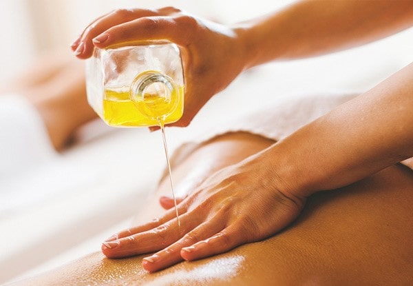 Massaging with oil