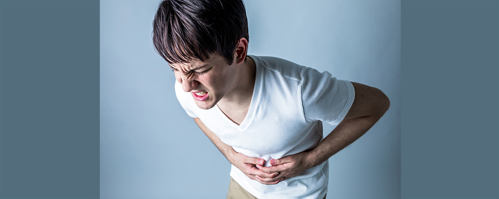 young man having a stomachache